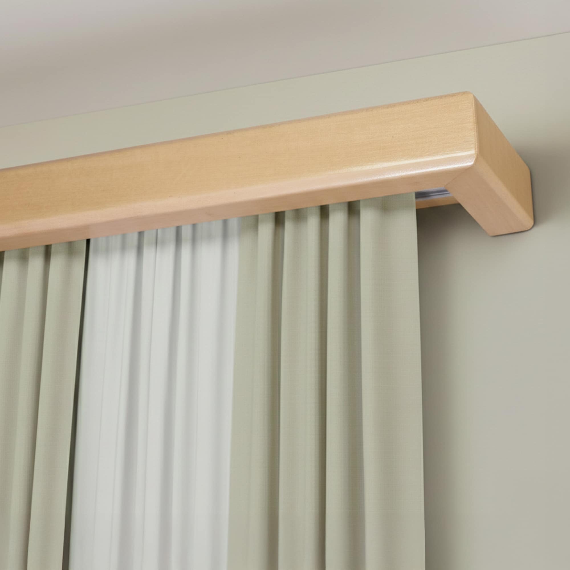 Curtain and drape track system with square wooden valance